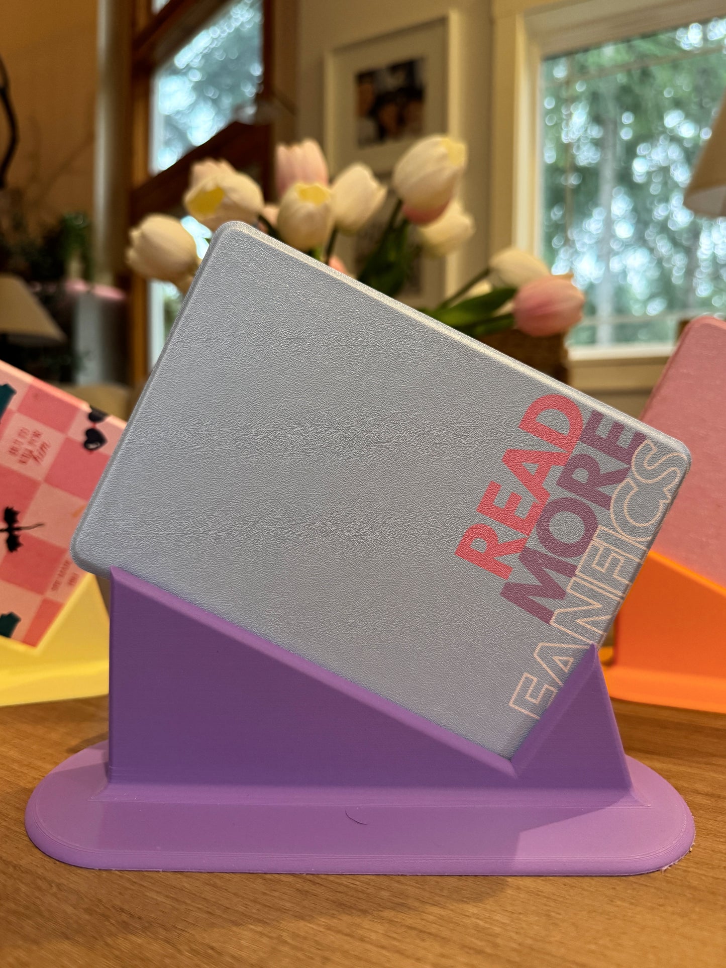 Titled kindle stand for laying down- ereader holder- bookish goods