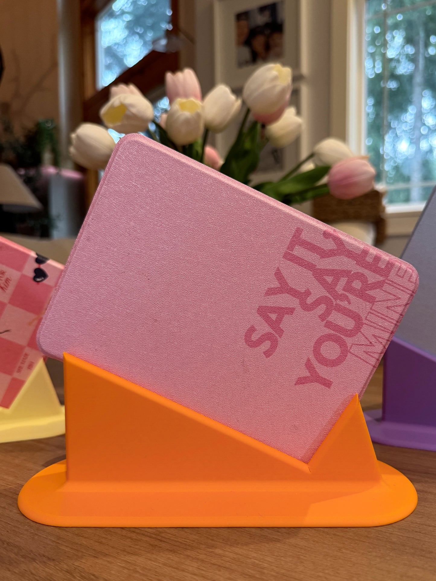 Titled kindle stand for laying down- ereader holder- bookish goods